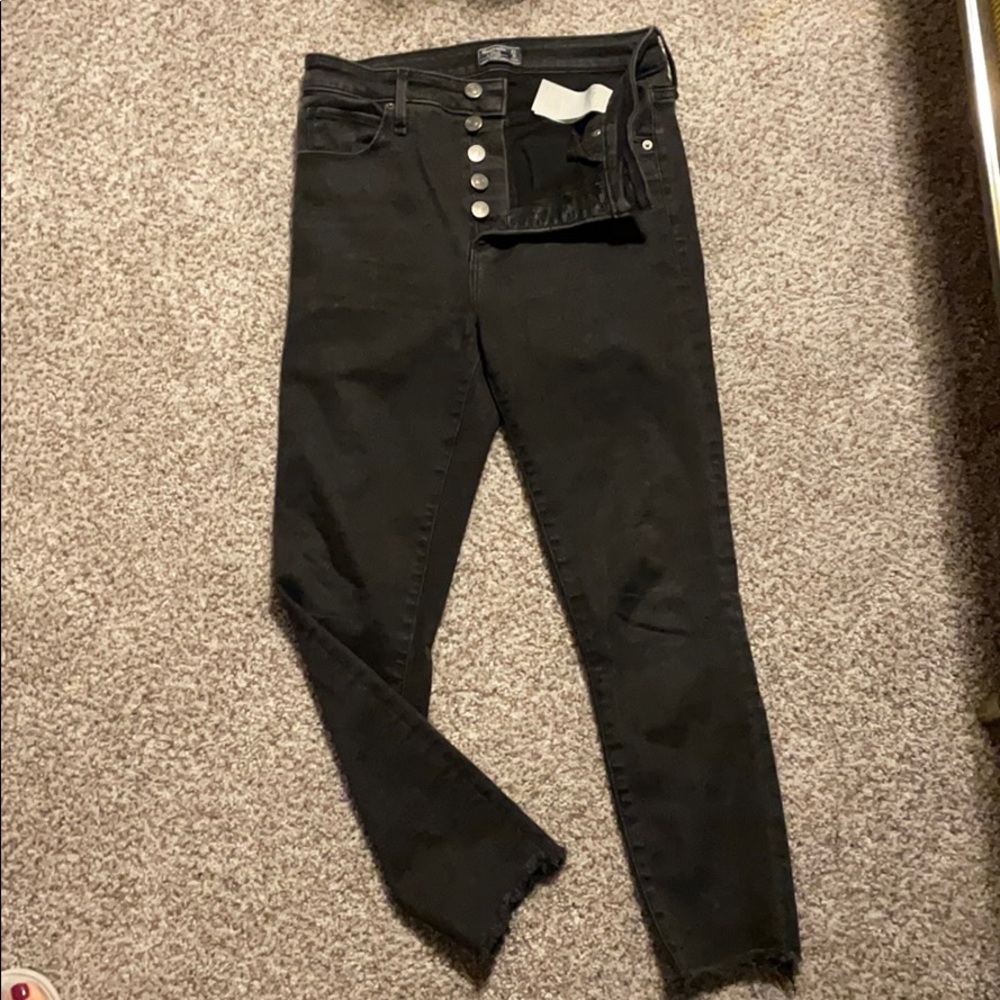 Raw hip. Button fly Abercrombie and Fitch jeans.4s